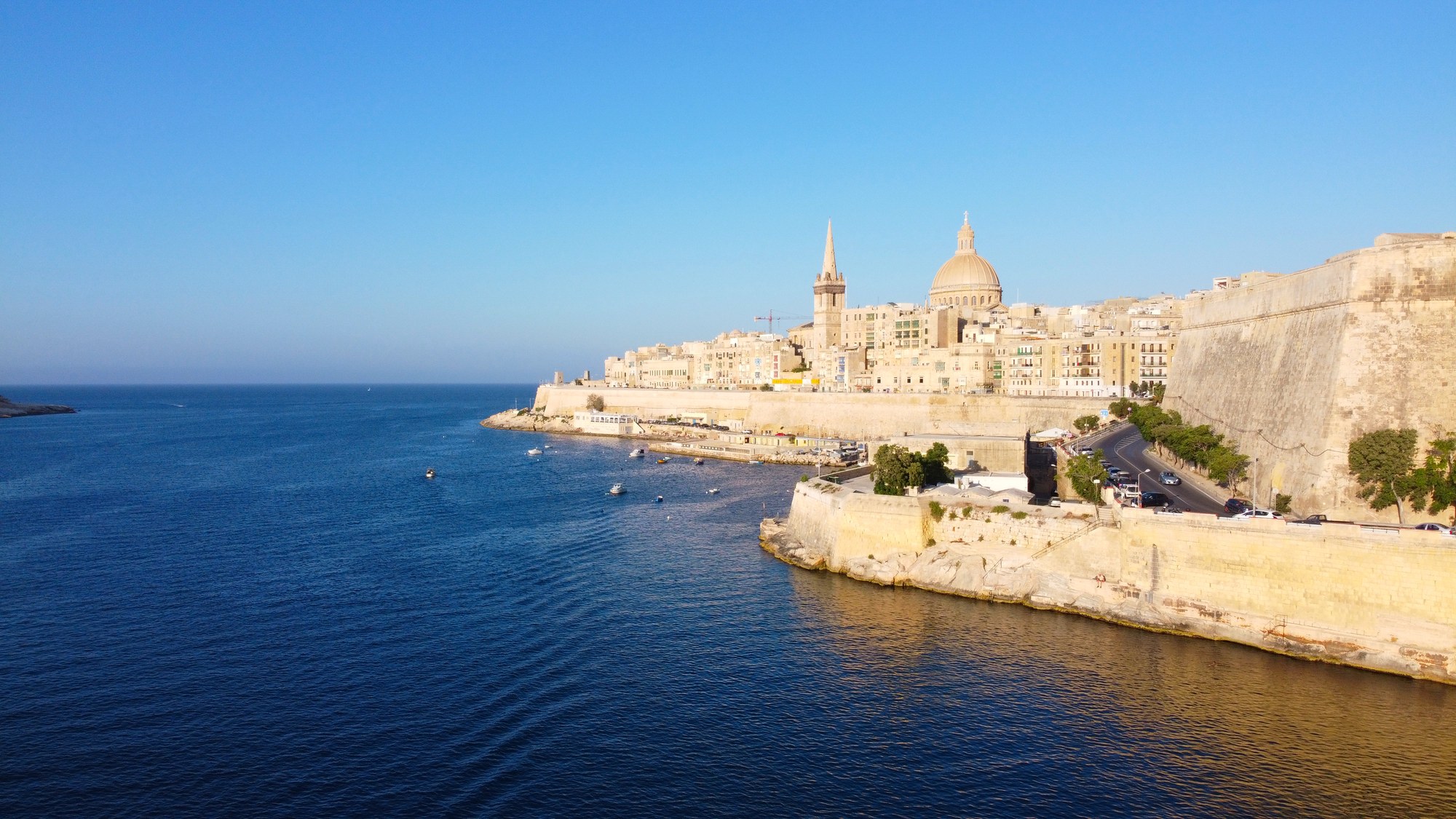 Aerial view of Valletta's fortified waterfront beside the Mediterranean